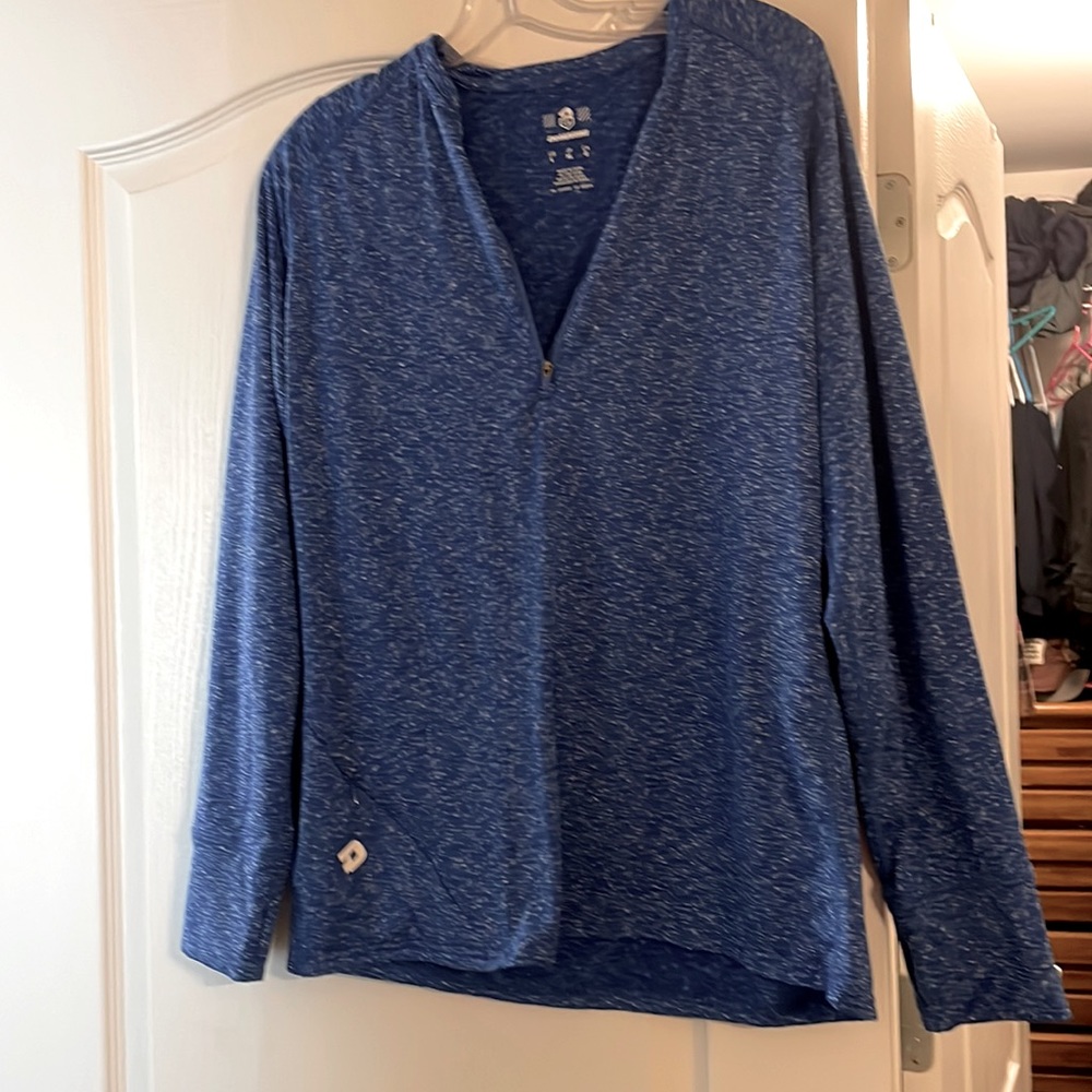 Half zip blue workout sweatshirt. Super comfy and stretchy material.
